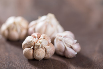 Fresh garlic on wooden background,spices and herbs,food ingredients