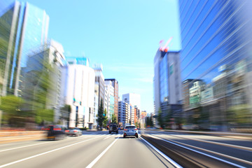 Fototapeta na wymiar Car driving fast in Tokyo