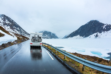 Caravan car travels on the highway.