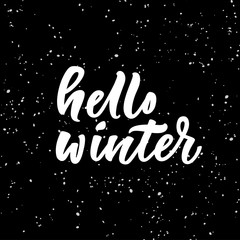 Hello winter lettering on black background.