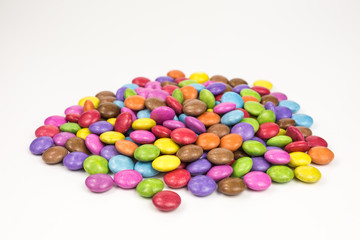 heap of multicolored sugar coated candies