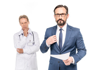 businessman holding medical document