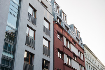 Obraz premium white and red apartment houses