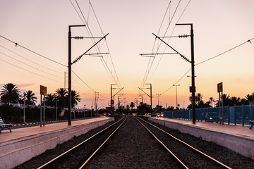 Fototapeta na wymiar Railway tracks in the evening light, Metro to Monastir.