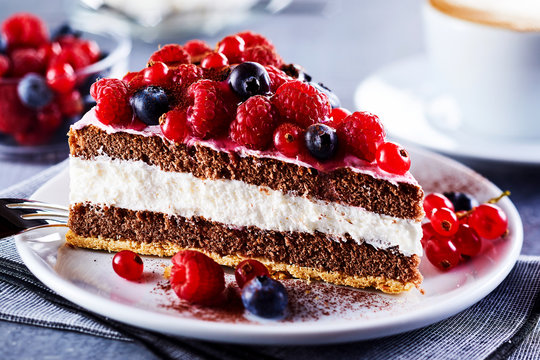 Portion of layered cake with fruits