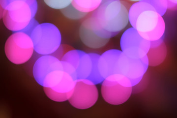Fototapeta premium Colorful abstract blurred circular bokeh light of night city street for background. graphic design and website template idea concept design.