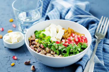 Barley pomegranate raisins feta salad
