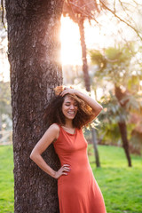 cheerful black afro woman outdoors