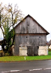 Old wooden and concrete barn