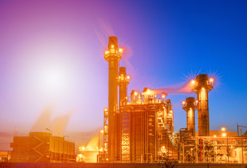 Fototapeta premium Industrial zone,The equipment of oil refining,Close-up of industrial pipelines of an oil-refinery plant,Detail of oil pipeline with valves in large oil refinery.