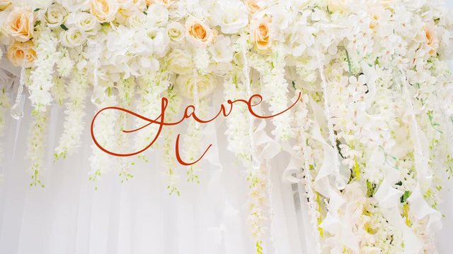 Written animation Save the Date calligraphy lettering text with Ornate frame elements on wedding arch with white and pink flowers. Vintage and filigree decoration. Filigree divider wedding Invitation