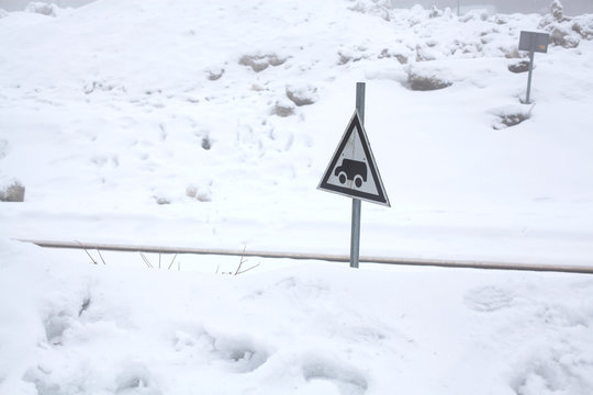 winter- covered by snow the railway crossing