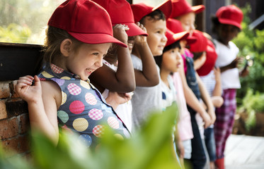 Obraz premium Group of kindergarten kids learning gardening outdoors field trips