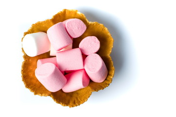 Colorful foam candy in edible bowl