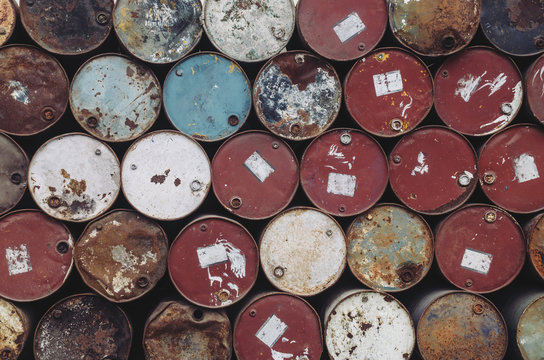 Bunch of old, rusted petrol barrels; petrol barrels pattern