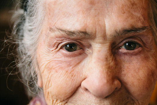 Eyes close up of senior woman. Happy grandmother