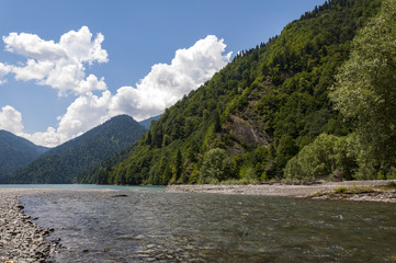 Fototapeta na wymiar Lashipse River flows into the Ritsa Lake in Mountains.Abkhazia.