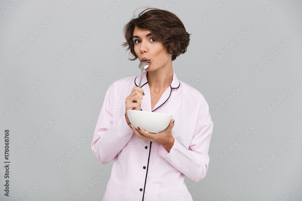 Poster portrait of an attractive young girl in pajamas