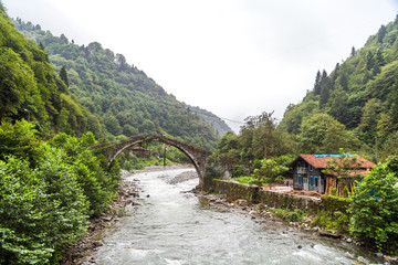 Fototapeta na wymiar Historical Stone Bridge on Firtina River