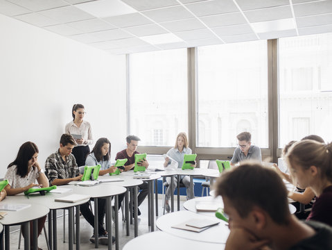 Students Studying At Modern Classroom