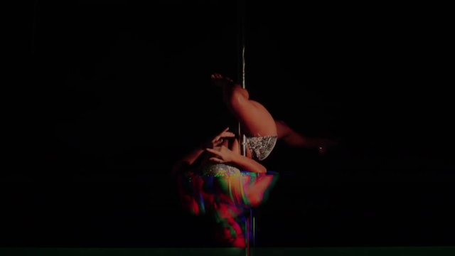 amazing pole dancer showing her skills. this series has intentional video distortion added