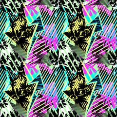 Abstract seamless geometric pattern with flowers, arrows,triangles and strips.