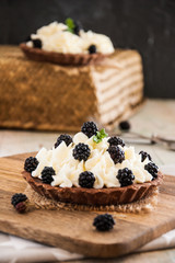 cakes with berries stacked in rows