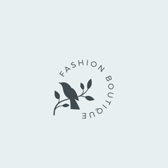 Obraz premium Fashion Boutique Abstract Vector Sign, Symbol or Logo Template. Bird on a Branch Silhouette with Modern Typography. Premium Quality Feminine Emblem. Good for Beauty Salon, SPA, Wedding Boutiques, etc.