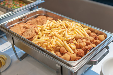 fried escalope in buffet pan