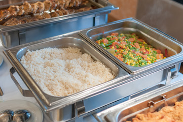 rice and vegetables in buffet pan