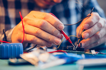 Man working with electrical components