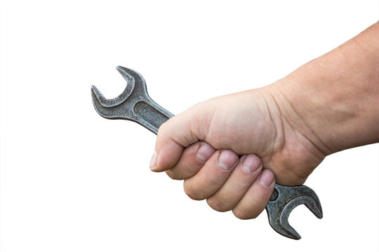 Wrench in male hand isolated on white background