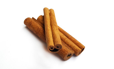 Cinnamon sticks on white background