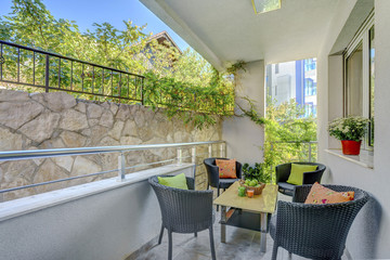 Terrace of a private apartment, decorated table with fuits
