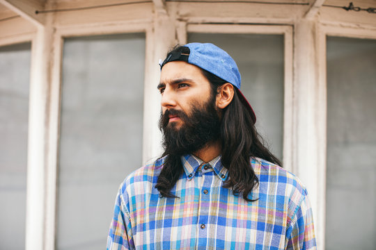 Portrait of hipster bearded man wearing vintage clothes.