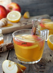 Apple tea with cinnamon, cloves, lemon and honey