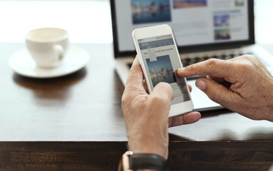 Elderly man is using mobile phone