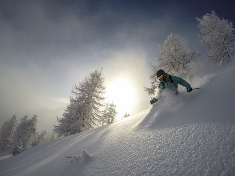 Man skiing down slope
