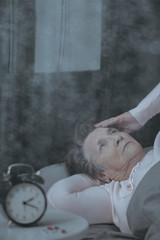 Older woman suffering from insomnia