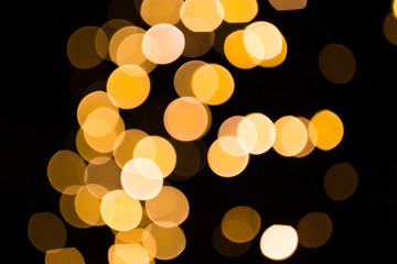 blurred golden lights over dark background