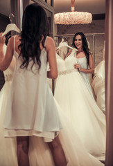 Fototapeta premium Beautiful bride in wedding salon