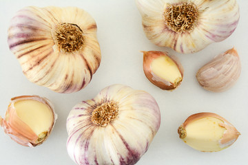 Closeup of garlic cloves and bulbs