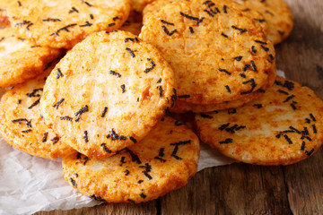 Japanese healthy snack: rice cakes with algae close-up. horizontal