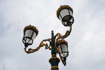 Fototapeta na wymiar Beautiful street lamp on the sky background