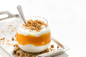 dessert with pumpkin, sweet cream and cookies