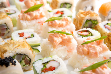 Closeup on japanese sushi rolls,maki on white background