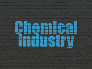 Industry concept: Painted blue text Chemical Industry on Black Brick wall background