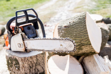 cutting wood with a motor saw