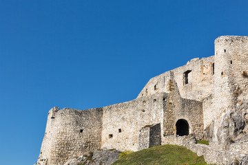 Fototapeta na wymiar Walls of Spis Castle against clear blue sky in Slovakia.