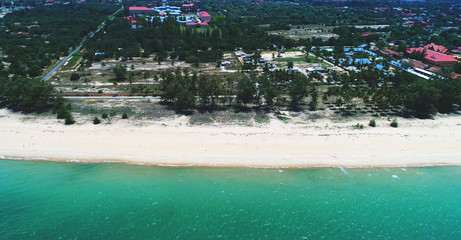 Aerial view. Beautiful color separation between beach and ocean.